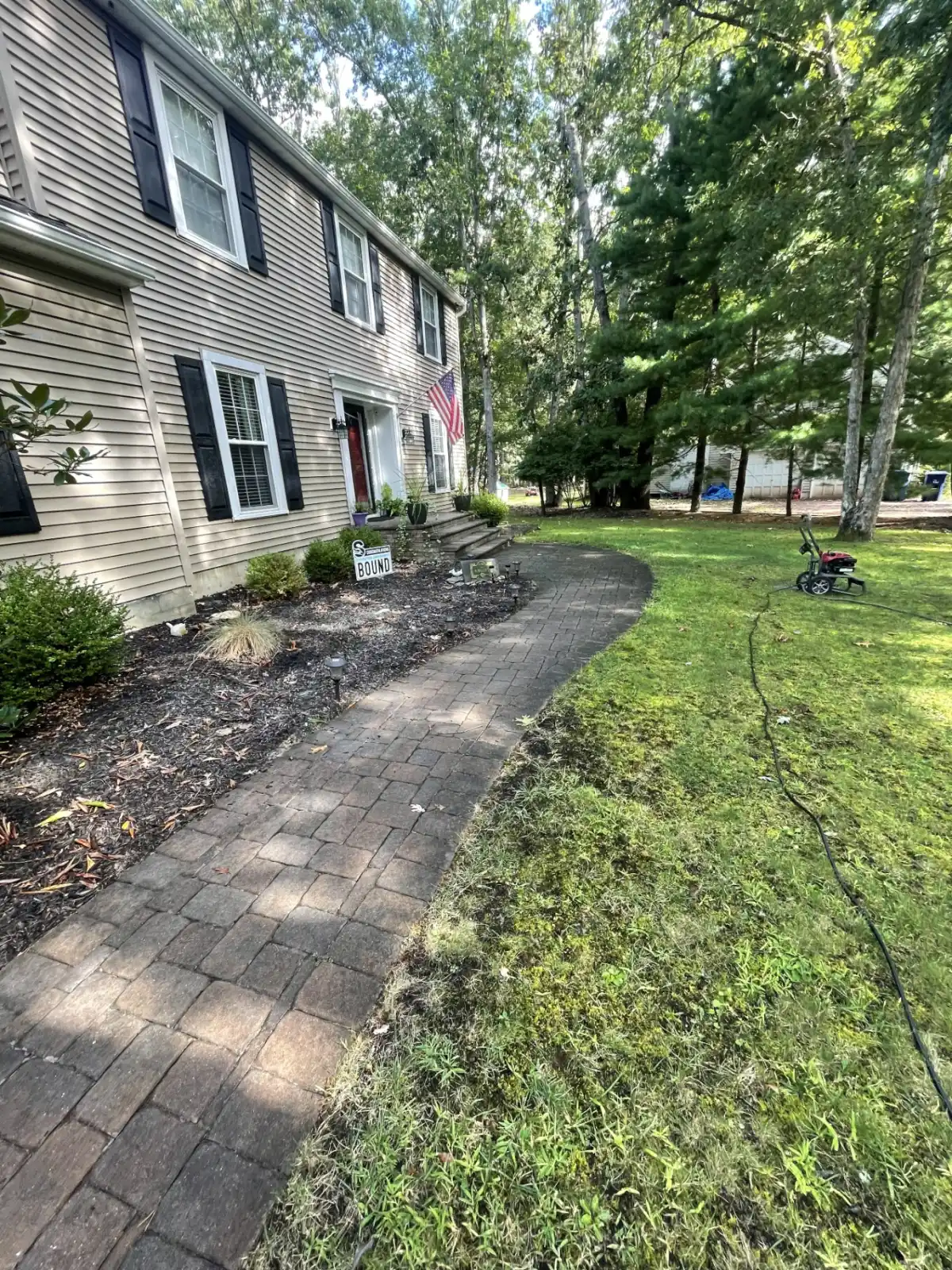 Front pavers before power washing